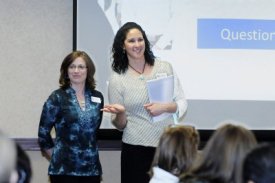 ABMP School Liaison Cindy Williams and ABMP Education Facilitator Taffie Lewis answer questions about ABMP resources for instructors at an IFL workshop. 