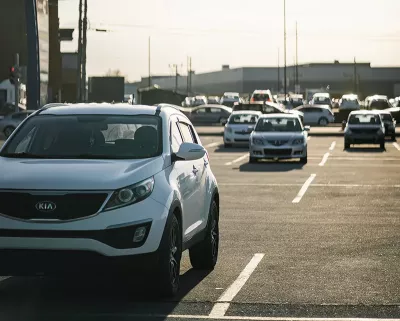 cars in traffic along a major road.