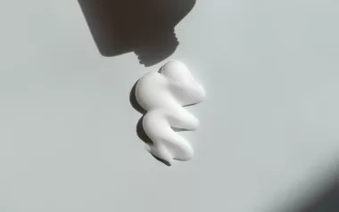 Cream comes out of a tube.