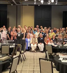 Attendees of the 2022 ABMP School Forum pose for a group picture.