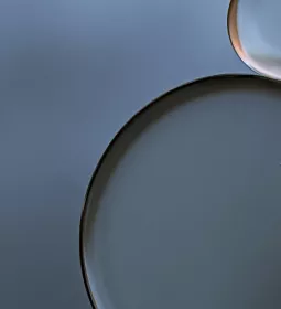 Abstract circles in clear, black, and gray colors.