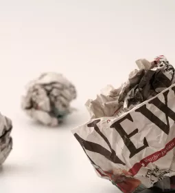 crumpled balls of newspapers.