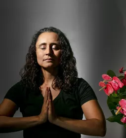 Stormy Mesa in a meditative pose.