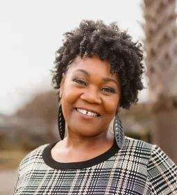 Portrait of Adriane Maxwell.