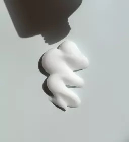 Cream comes out of a tube.