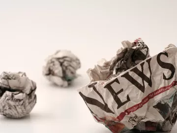 crumpled balls of newspapers. 