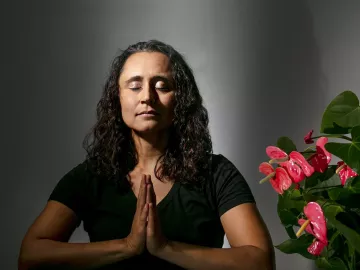 Stormy Mesa in a meditative pose.