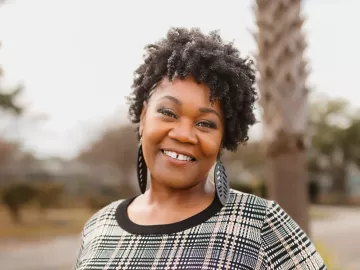 Portrait of Adriane Maxwell.