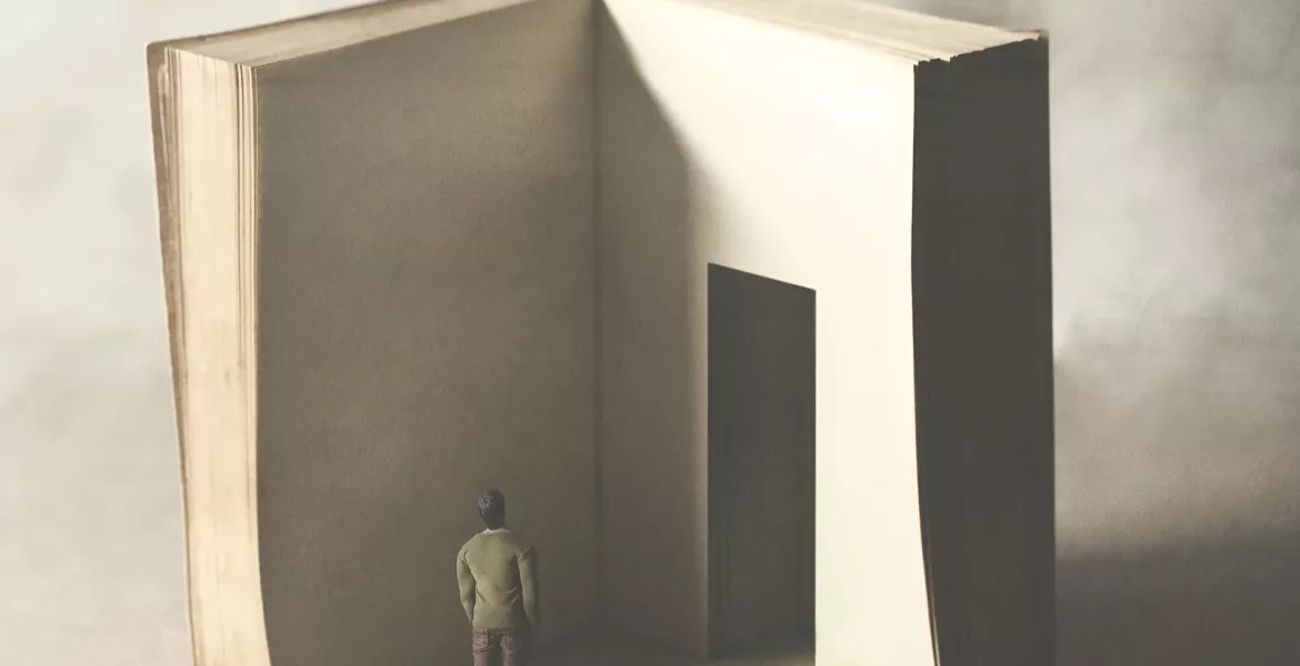 A conceptual image of a person looking at a book or story with a doorway in a page..