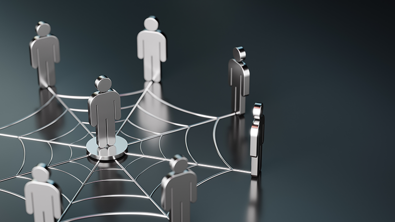 Metallic figures arranged in a web-like pattern.