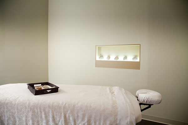 A massage table in a tranquil massage room