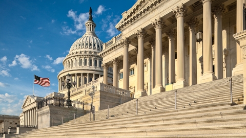 Detail view of the US Capitol east facade in the early morning sun.